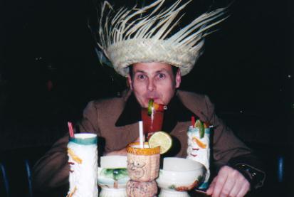 The Jab sampling Trader Dick's drinks, 2001 - all the mugs came with the drinks then, even the hat, which comes with the Cha Cha!