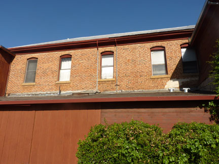 You can see part of the original brick building on the second floor of Giannini's. image by California Bricks web site.