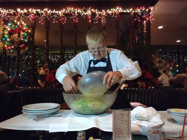 our waitress Lisa preparing tableside Caesar salad - it was delicious! -  photo by Dean Curtis, 2015