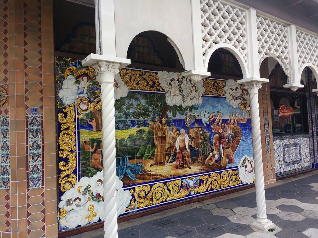 one of the tile murals on the building's facade - photo by Dean Curtis, 2016