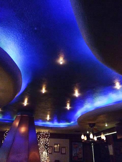 amazing free-form ceiling with cool lighting - photo by Dean Curtis