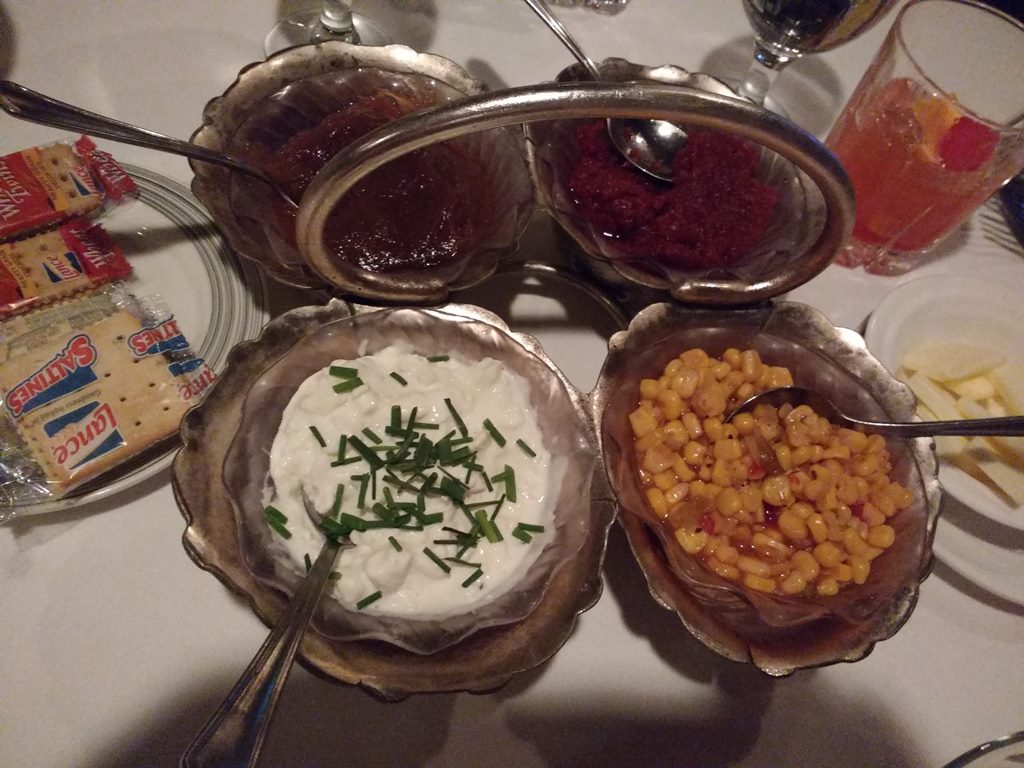 relish tray of (clockwise from LL) farmers cheese, apple butter, beet horseradish, and corn relish - photo by Dean Curtis, 2016